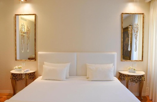 Sandim House | Sundial Gardens & Suites