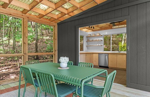 Delancey House | Sunlit Airstream in Trees with Expansive Deck + Nature Views