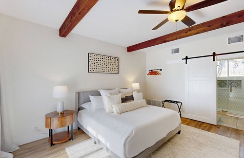 Comanche Trail Condo | Sunlit condo with water view, furnished balcony, washer/dryer, & central AC