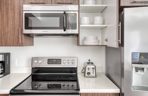 Centennial Apartment | Sunlit Redwood City 1BR w/W/D, next to Caltrain, by Blueground
