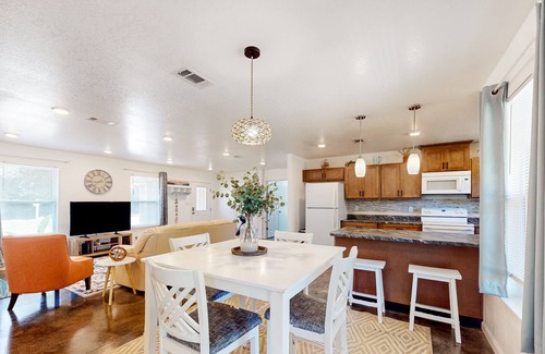 Northeast Pensacola House | Sunny and updated home with workspace, beach gear, games, and firepit