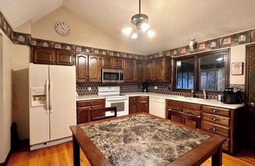 Lincoln House | Sunny Brick Home with big Sunroom 4BR, 3BA