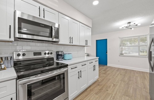 Palmetto House | Sunny Palmetto Oasis: 4BR Home with Private Pool by RedAwning