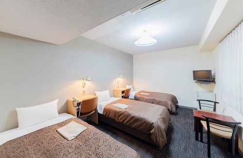 Esaka Hotel | Sunny Stone Hotel