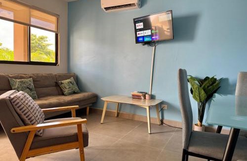 Coco House | Sunny Tropical Condo And Rooftop Terrace