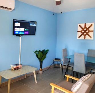 Coco House | Sunny Tropical Condo And Rooftop Terrace