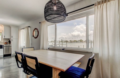 Indian Rocks Beach House | Sunrise Suite Waterfront Duplex- hot tub, kayaks, SUPs, 3 blocks to the beach