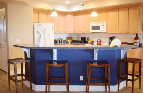 Chincoteague Condo | Sunset Bay Villa 210-Downtown Waterfront Sunsets