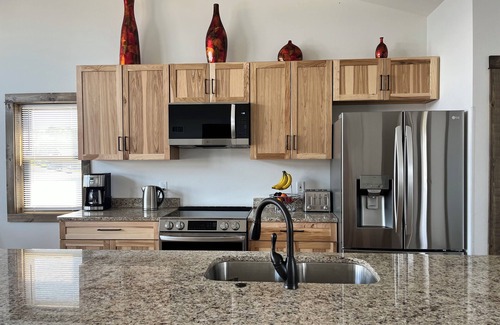 New Lisbon House | Sunset Lake Paradise new 4-bedroom lake house with private beach, WiFi, and AC
