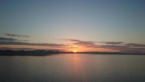 Nin Apartment | Sunset view at the sandy beach - Nin luxury apartment