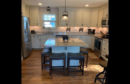 Lochmere House | Sunset View Lake Front Living with Dock & Boat Ramp on Lake Winnisquam