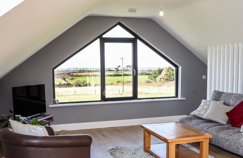 Fethard on Sea Cabin | SUNSET VIEW LODGE, pet friendly in Fethard-On-Sea, County Wexford