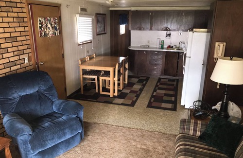Stoddard House | Sunset Waters: Serene Retreat on the Mississippi River Shoreline Fisher Friendly