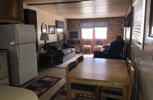 Stoddard House | Sunset Waters: Serene Retreat on the Mississippi River Shoreline Fisher Friendly