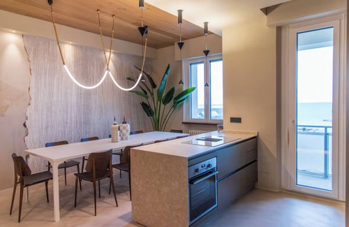 Fano Apartment | Super Beachfront Penthouse for Families with Breakfast, 2 Parking Spaces, Private Beach