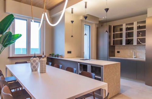 Fano Apartment | Super Beachfront Penthouse for Families with Breakfast, 2 Parking Spaces, Private Beach