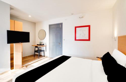 BTM 2nd Stage Hotel | Super Townhouse BTM Layout Near Madiwala Lake Formerly Q Rooms