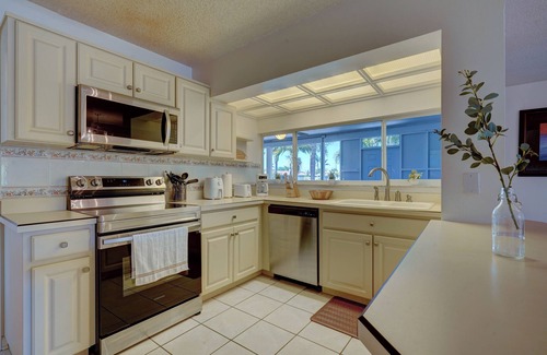 Cocoa Isles House | Surfer's Corner - Cozy Waterfront Oasis w/Fire Pit - Walk to Beach