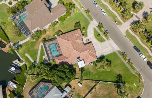 Apollo Beach House | Surfside Beach House - Gorgeous Canal Front Home - Heated Pool & Boat Dock