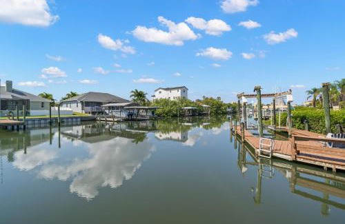 Apollo Beach House | Surfside Beach House - Gorgeous Canal Front Home - Heated Pool & Boat Dock