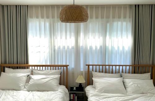 Suyeong-Gu House | Swiss Cottage
