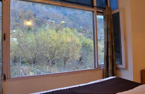 Bashisht Bed & Breakfast | Sylvan Woods Cottage