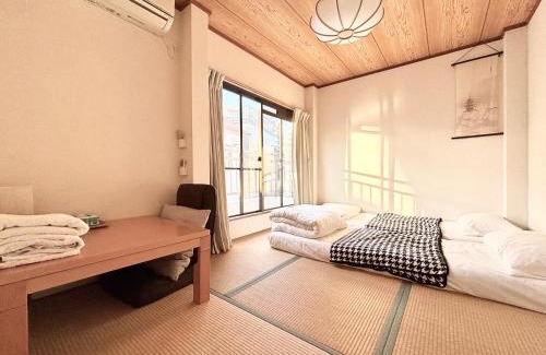 Shin-Osaka House | SYOGA A house, next to natural park