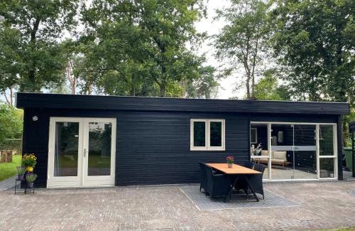 Hattemerbroek Ski Chalet | 'T Veluwse Boshuus chalet 44