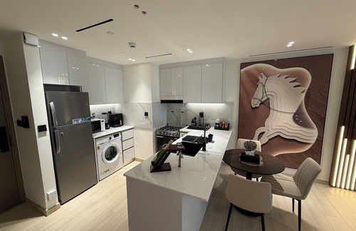 Al Quoz Apartment | Tag Vacation Homes - Charming 1-bedroom apartment, fully equipped, Dubai.