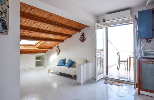 Sant'Agata di Militello Apartment | Tasteful top floor apartment with great roof terrace with beautiful sea view.