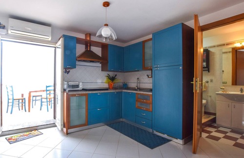 Sant'Agata di Militello Apartment | Tasteful top floor apartment with great roof terrace with beautiful sea view.