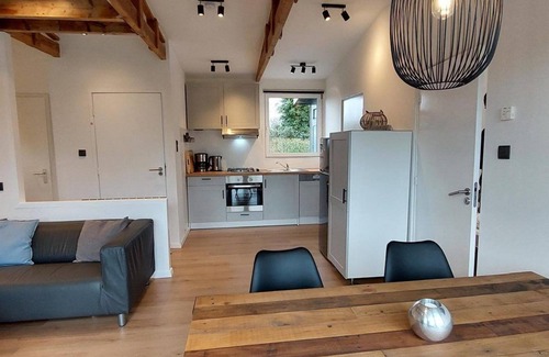 Sint Maartensvlotbrug House | Tastefully furnished, completely renovated 4-person bungalow on the popular park Eureka, near beach, sea, dunes and forest. Free WiFi, pet welcome. Ideal for families.