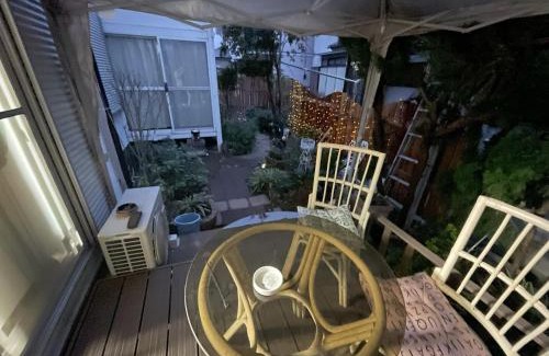 Edogawa House | Tatami room & Living Room equipped with Multinational TV and Fire, BBQ corner in Tokyo Downtown House