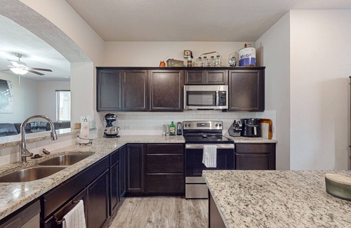 College Station House | Tavern style house with patio and enclosed backyard, close to golf course