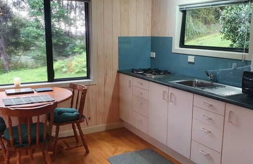 Russell House | Te Oneroa Hill, 5 acres of native park with wonderful sea view.