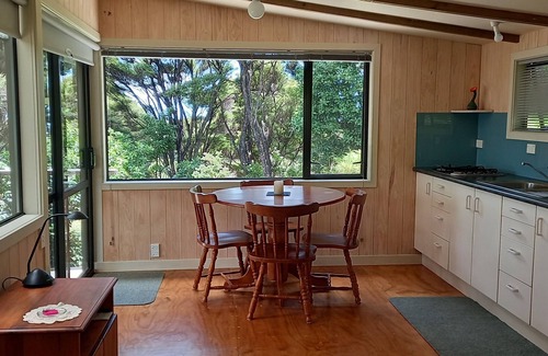 Russell House | Te Oneroa Hill, 5 acres of native park with wonderful sea view.