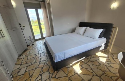 Aigialeia House | Temeni windmills