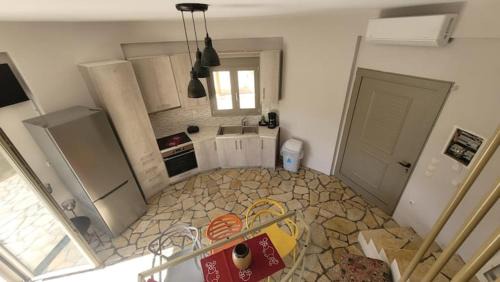 Aigialeia House | Temeni windmills