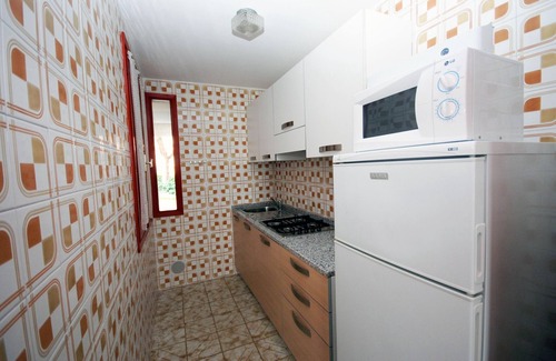 Lignano Pineta House | Terraced house with communal pool