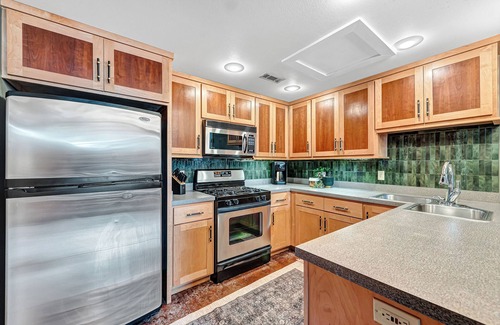 Fayetteville Condo | The Alma Mater on Dickson + 2 Parking Spots