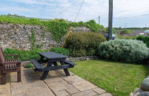 Llanddeusant Apartment | The Anchorage is a spacious 4-bedroom holiday cottage in Church Bay