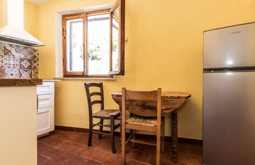 Seccheto Apartment | The apartment Tania is in Seccheto, with a beautiful view on the bay. It is completely renovated and