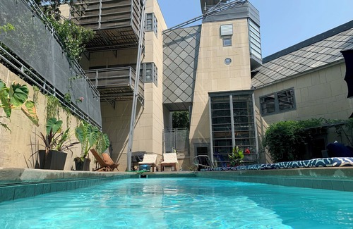 Lawrence House | The Architect’s Modern Castle with Heated Pool and Expansive Private Patio