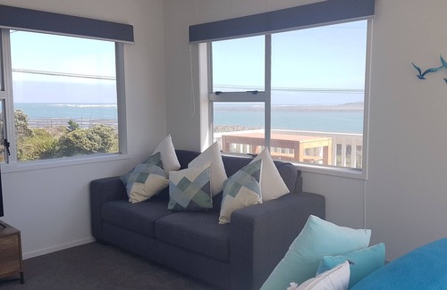 Raglan House | The beach front bach with ocean views!