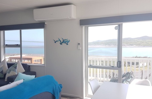 Raglan House | The beach front bach with ocean views!