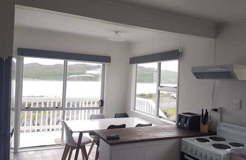 Raglan House | The beach front bach with ocean views!