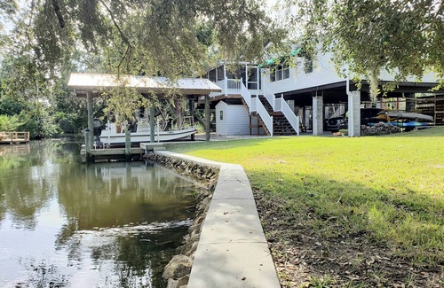 Crystal River House | The Bonefish—Mellow Ozello Canal Stilt Home—Kayaks, Dock, King Beds, Gulf Access