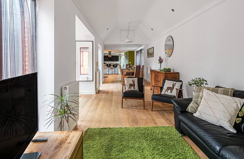 Wimborne Saint Giles Cottage | The bright and modern accommodation at The Cottage is all on the one level, with an open-plan layout