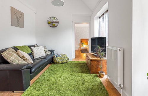 Wimborne Saint Giles Cottage | The bright and modern accommodation at The Cottage is all on the one level, with an open-plan layout