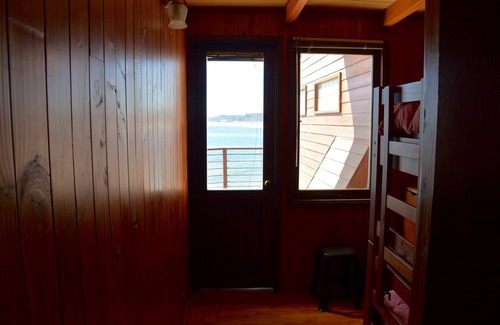 Concon House | The Brown House, in front of the Ocean next to the beach and waves at La Boca